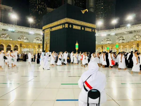 Muslim preparing spiritually for Hajj and Umrah through prayer and reflection in London