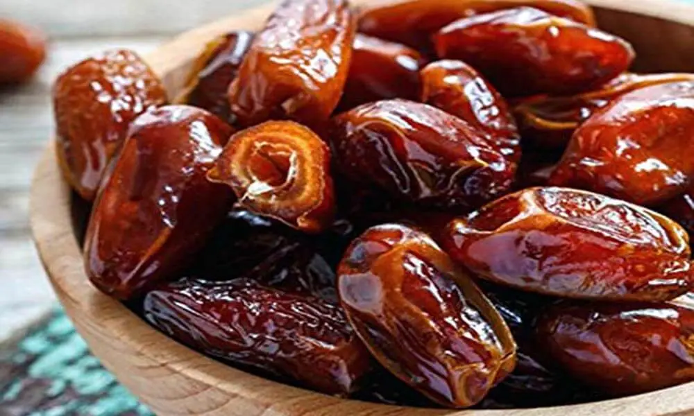Glossy dates served on a plate