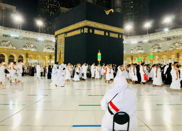 Muslim preparing spiritually for Hajj and Umrah through prayer and reflection in London