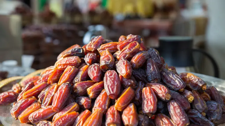 Dates stacked at a market