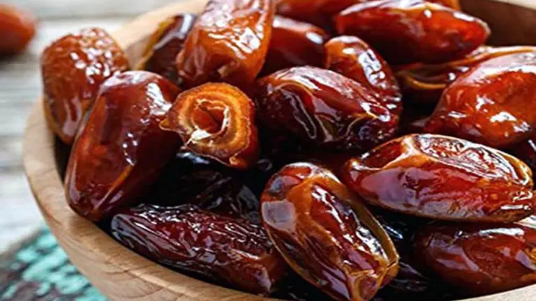 Glossy dates served on a plate