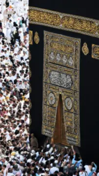 Muslim pilgrims performing tawaf around the Kaaba in Makkah in a peaceful spiritual atmosphere
