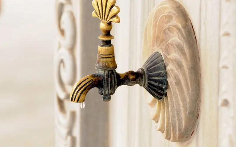 Decorative faucet illustrating wudu ritual ablution in Islam
