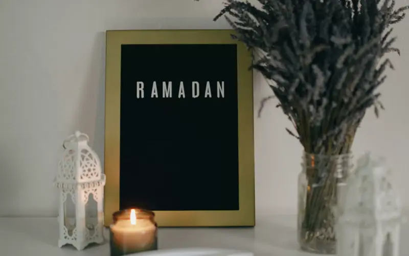 Ramadan decoration with candle and crescent moon