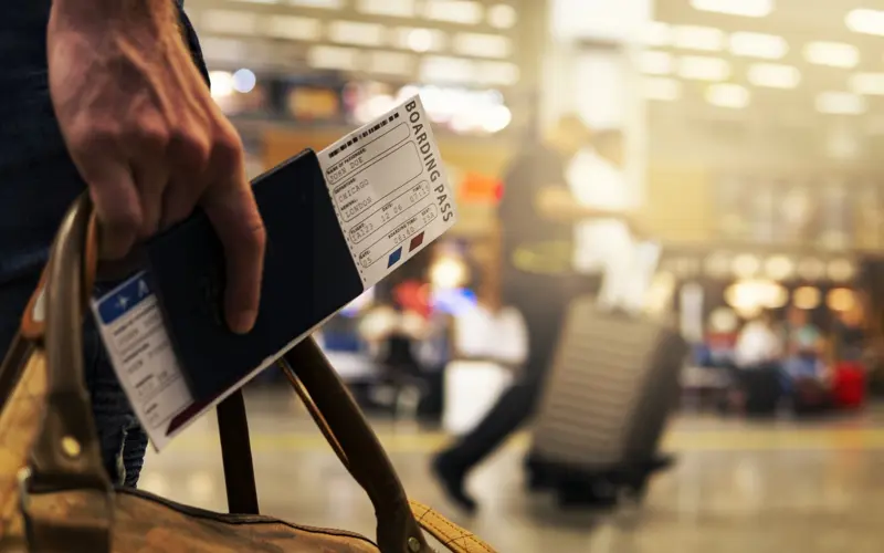 Passport and plane ticket at the airport