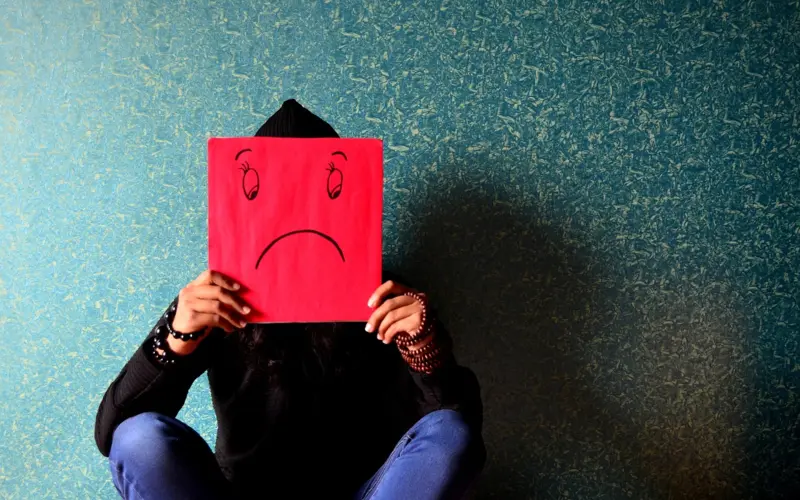 Sad person illustrating stress and anxiety