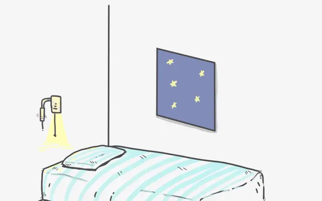 Lit illustré sous une fenêtre de nuit