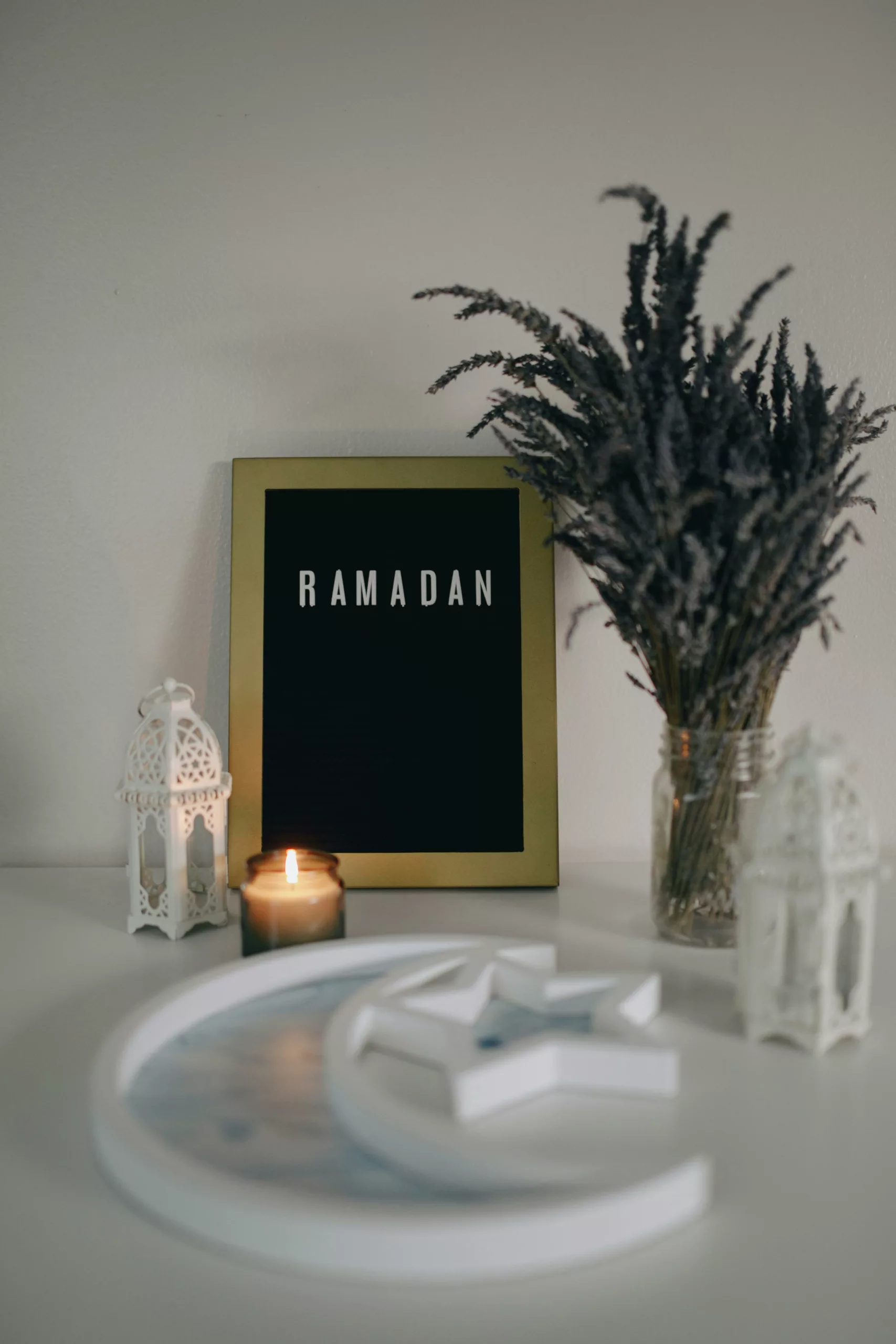 Ramadan decoration with candle and crescent moon