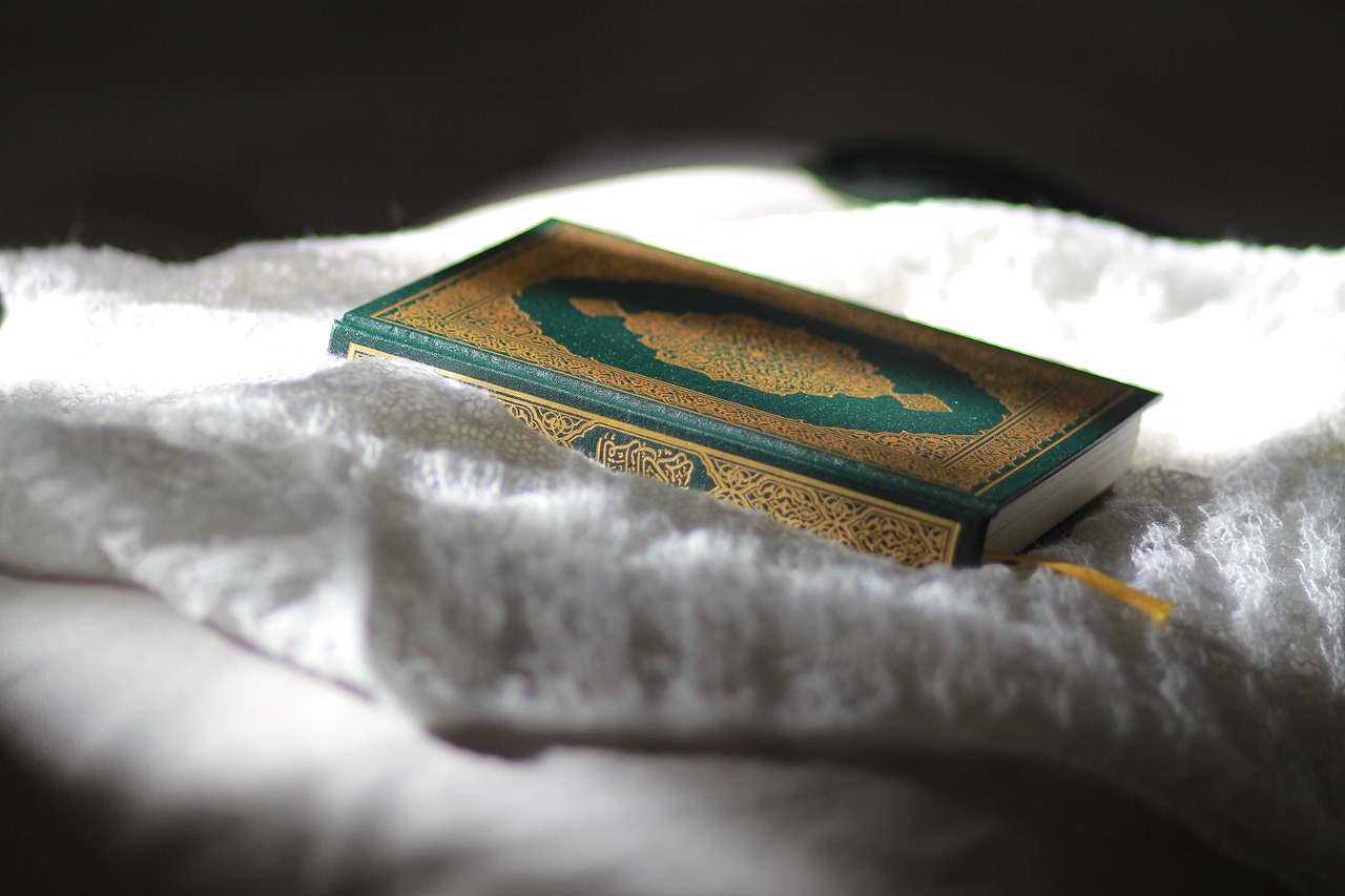 Quran placed on a white cloth