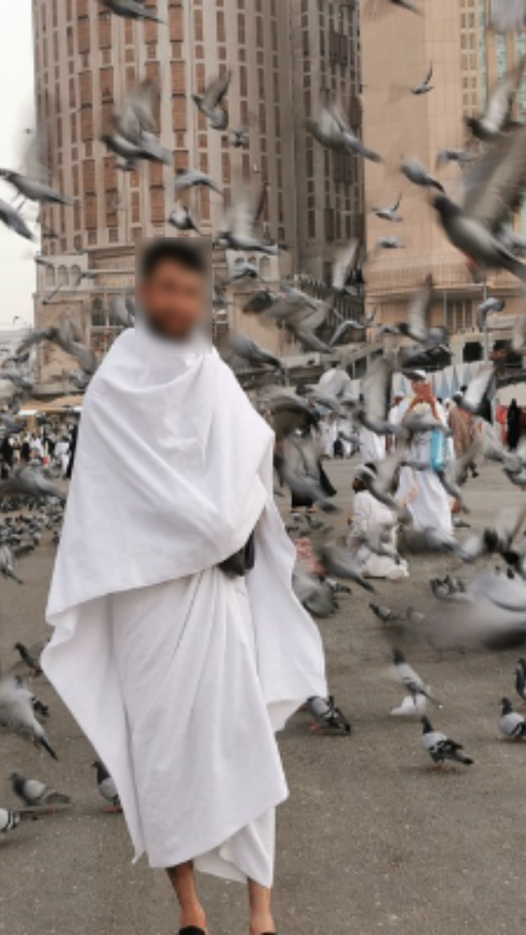 Muslim pilgrim reciting the Quran in front of the Kaaba during Umrah in a peaceful spiritual atmosphere